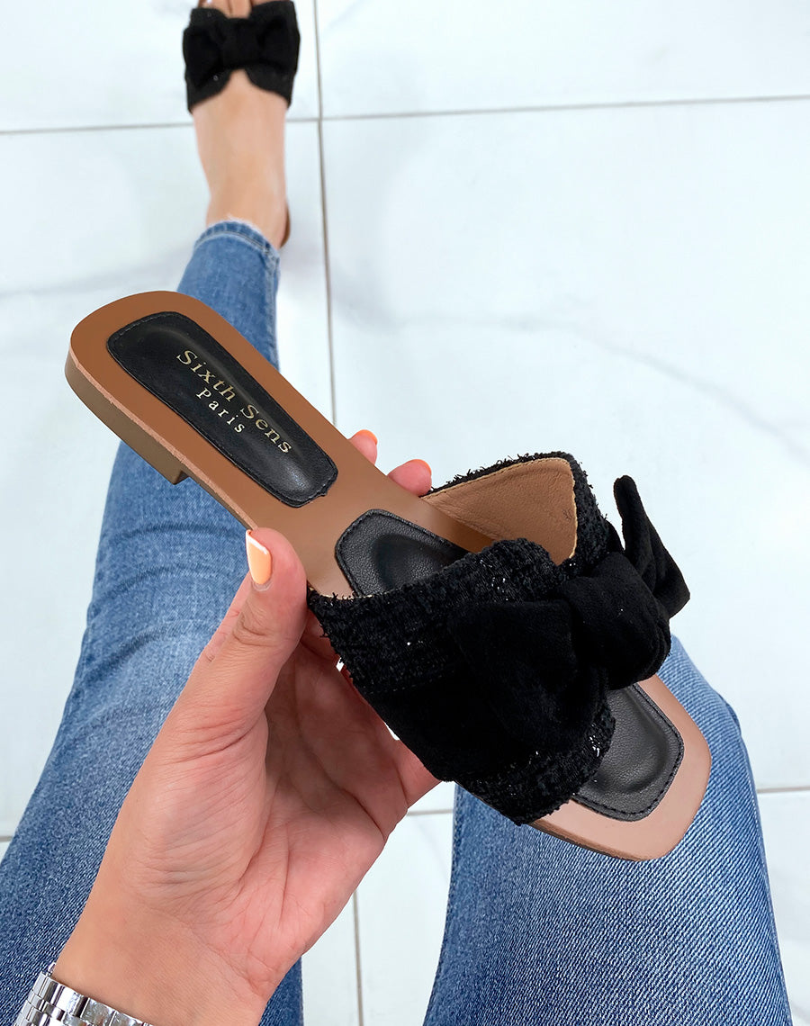 Mules plates noires avec noeud en suédine et bride en tweed