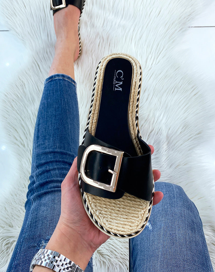 Mules plates noires à détail doré