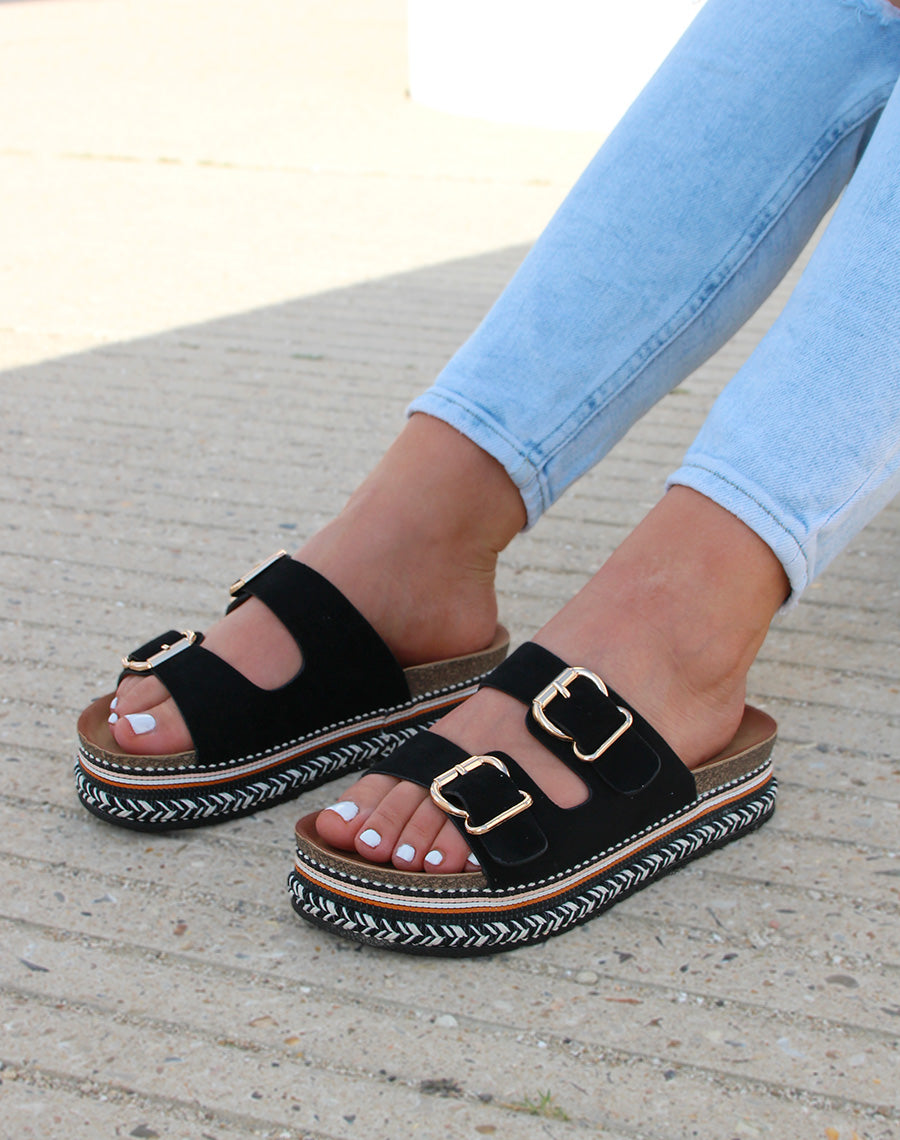 Mules plates noires à double bride et semelle aztèque