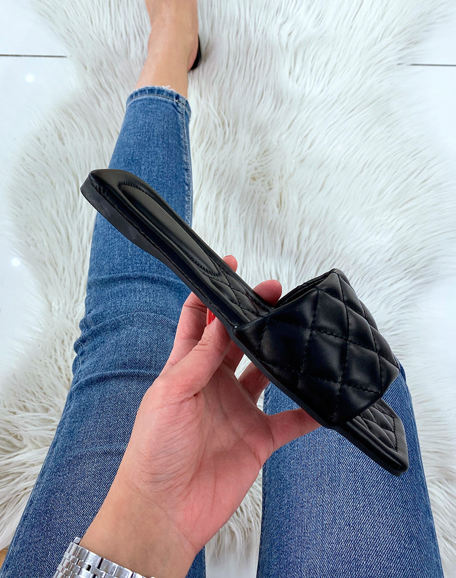 Mules plates noires matelassées