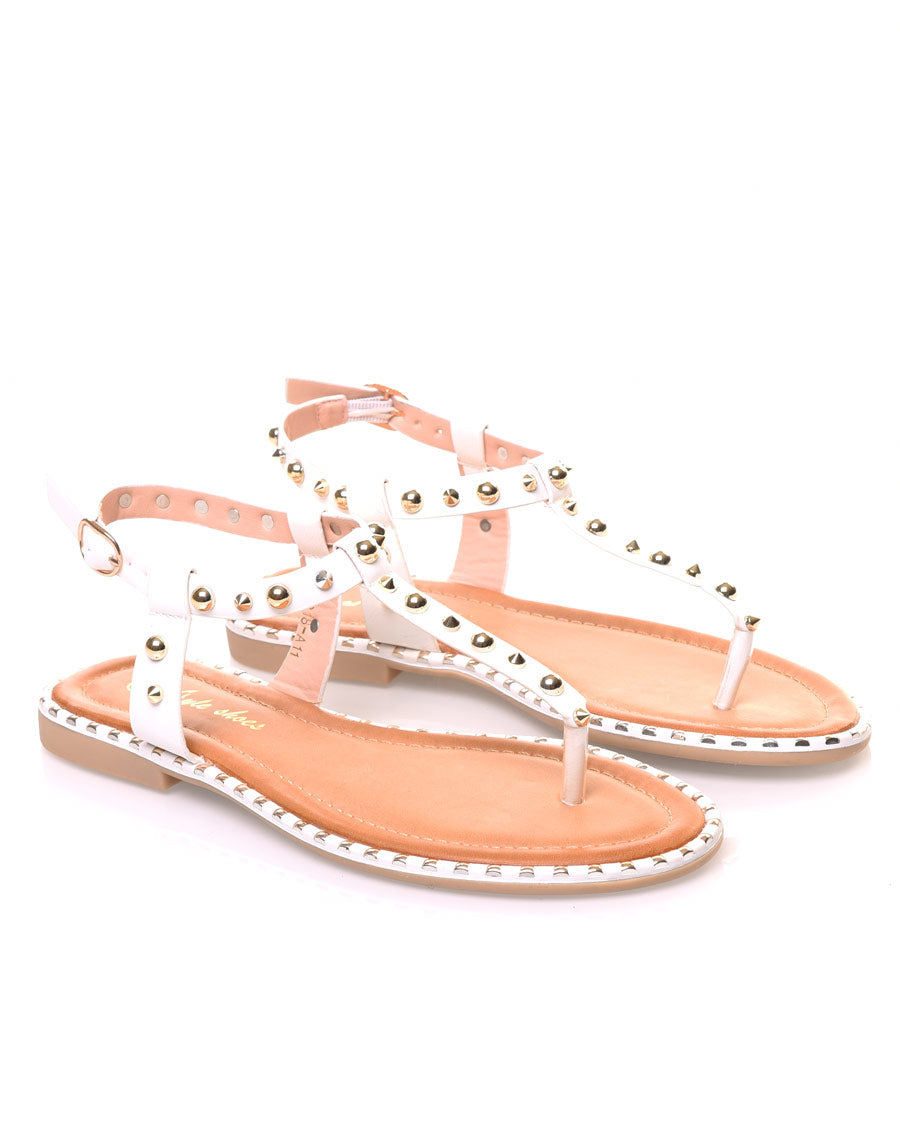 Nu pieds blancs cloutés or