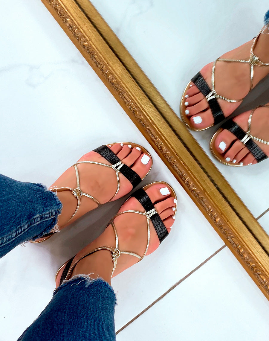 Nu-pieds noirs et dorés 