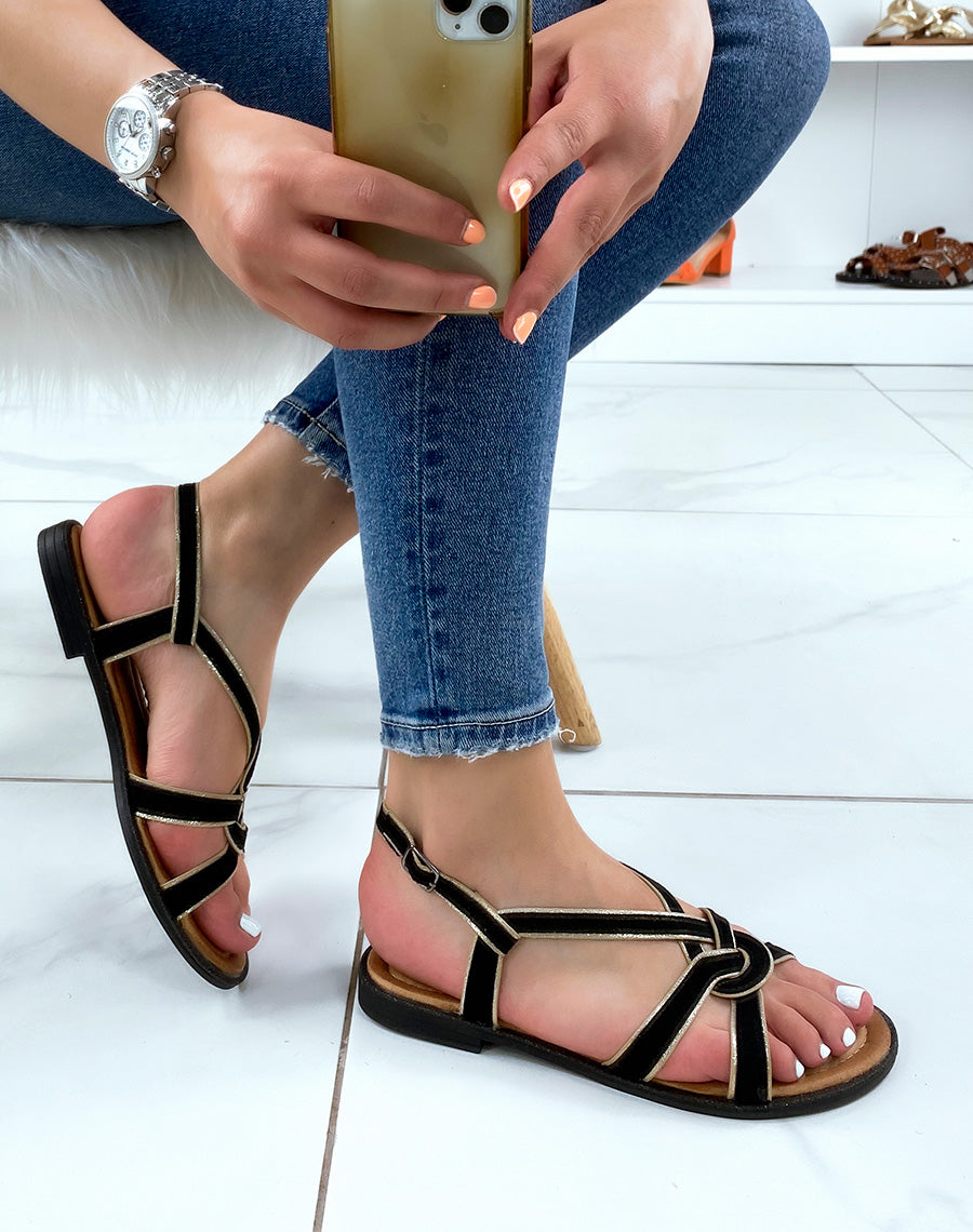 Nu-pieds noirs et lanières nouées dorées