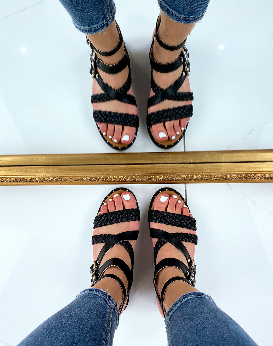 Nu-pieds noirs à multiples brides tressées et lisses