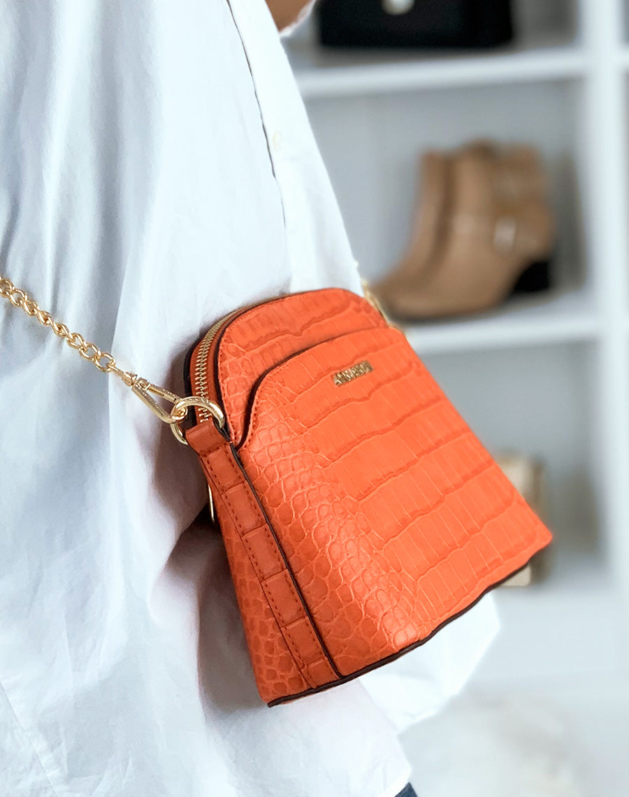 Pochette arrondie orange effet croco