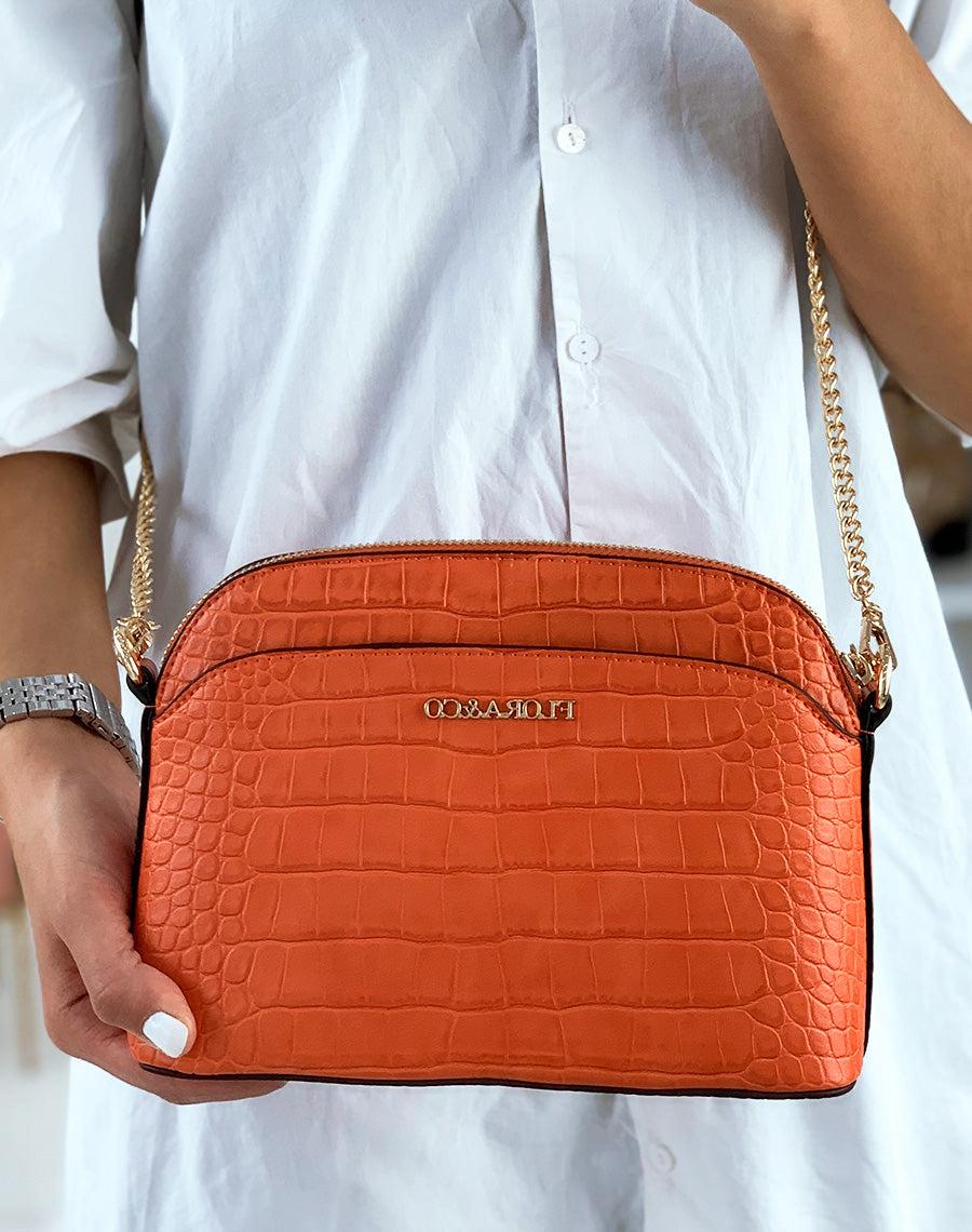 Pochette arrondie orange effet croco