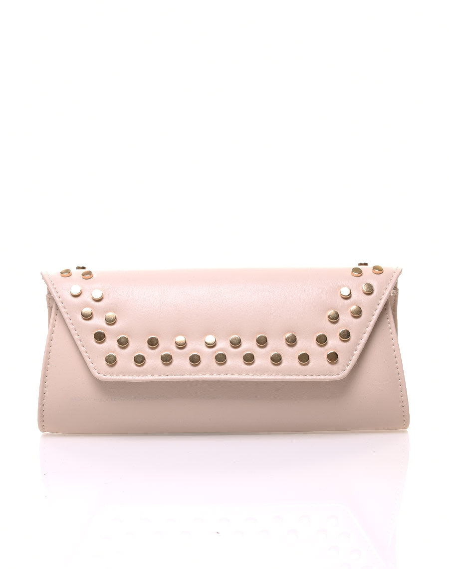 Pochette main cloutée beige