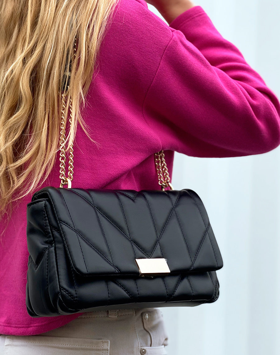 Pochette noire matelassée à détail doré