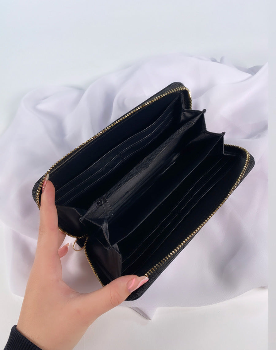 Portefeuille noir matelassé