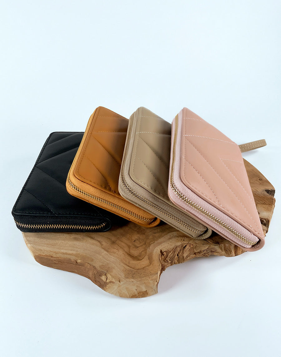 Portefeuille rose poudré matelassé chevron