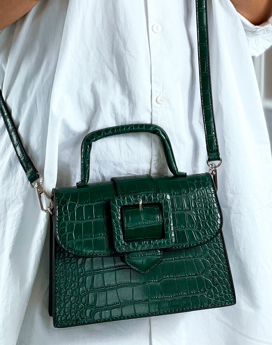 Sac à bandoulière vert effet croco à grosse sangle