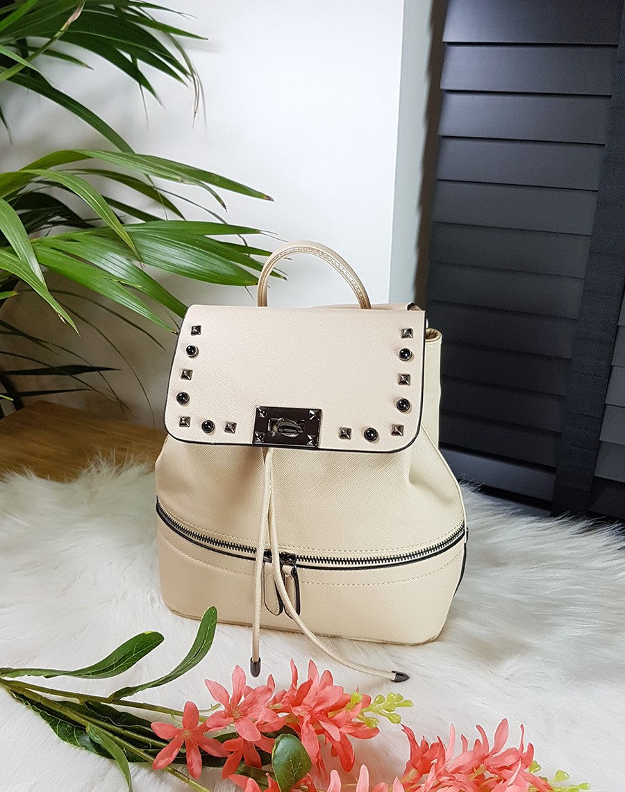 Sac à dos beige clouté