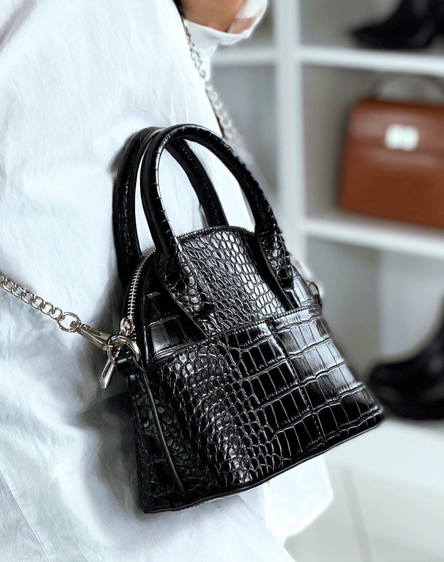 Sac en bandoulière noir arrondi effet croco