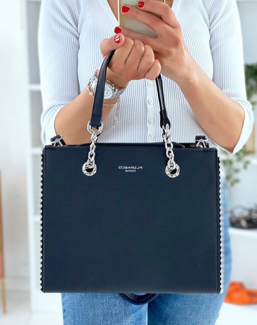 Sac à main bleu marine orné de clous argentés