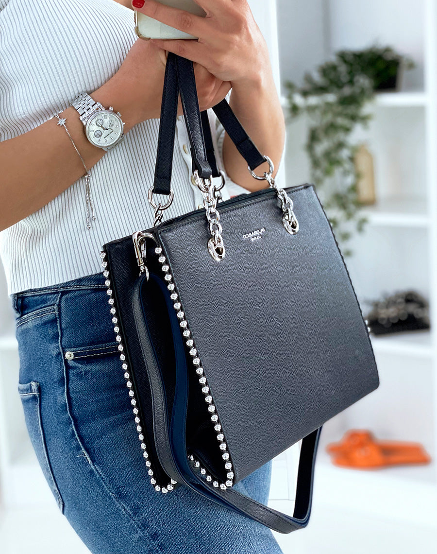 Sac à main bleu marine orné de clous argentés