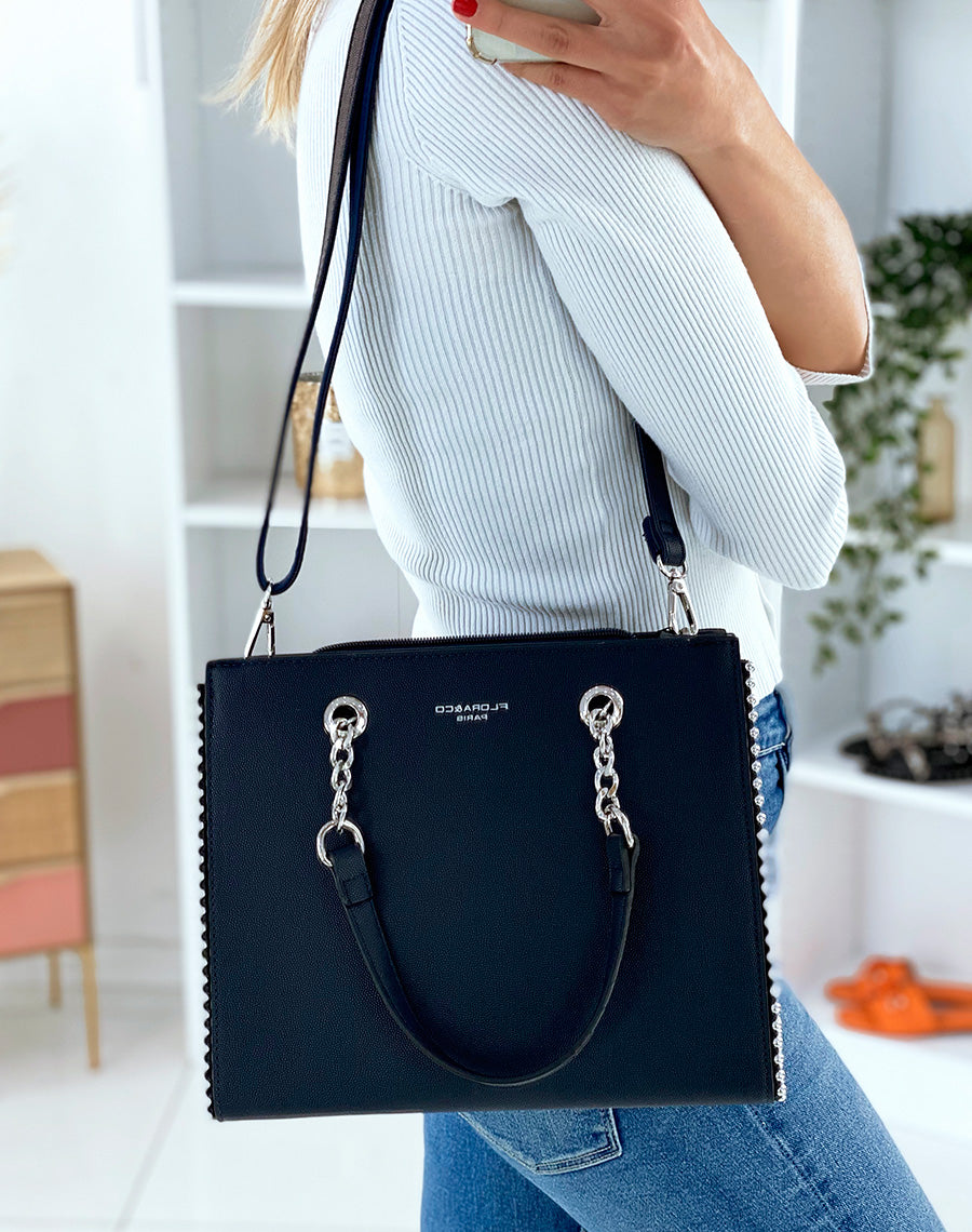 Sac à main bleu marine orné de clous argentés