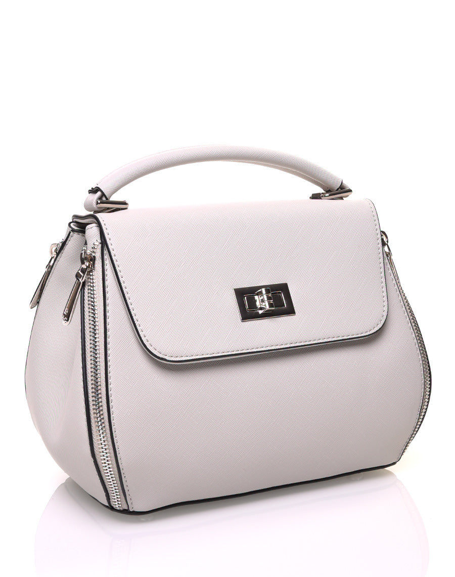 Sac à main gris clair à petite hanse avec verrou tournant
