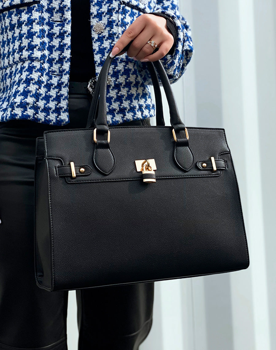 Sac à main noir à détails dorés 