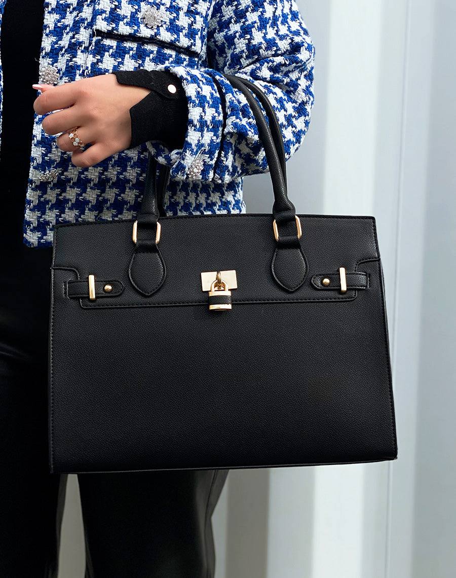 Sac à main noir à détails dorés 