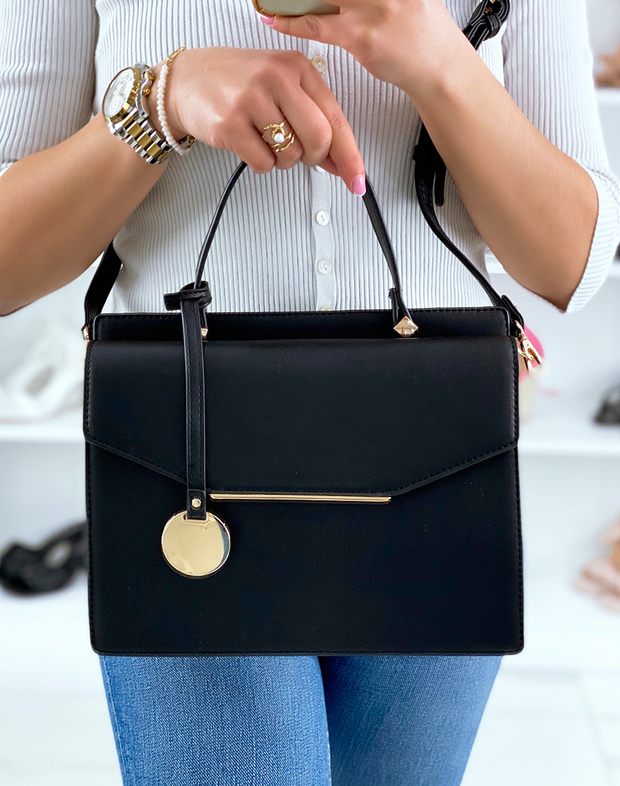 Sac à main noir à double ouverture et détails dorés