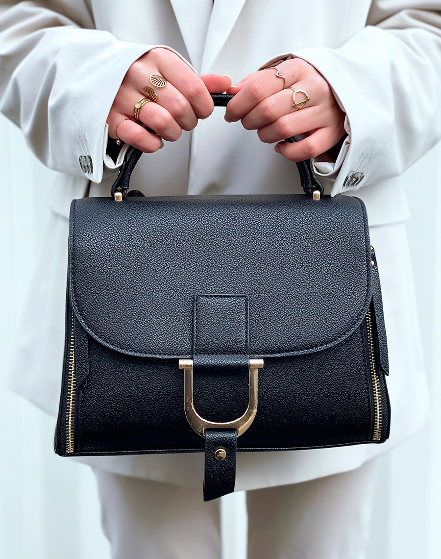 Sac à main noir à zips et bijou dorés