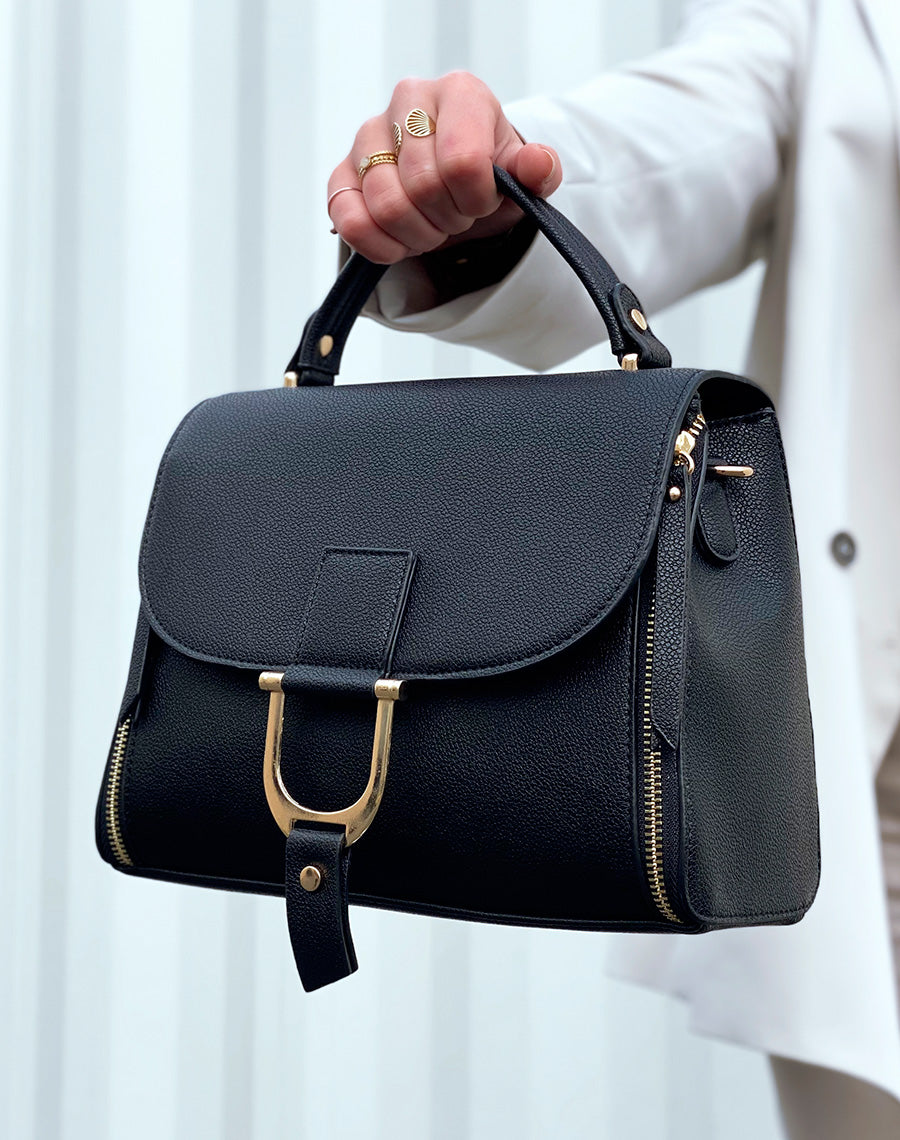 Sac à main noir à zips et bijou dorés
