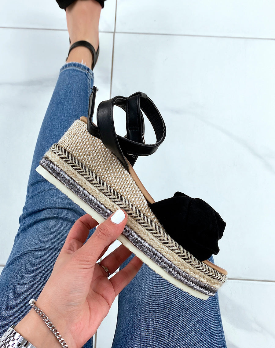 Sandales compensées à noeud en suédine noire et talon en toile de jute coloré