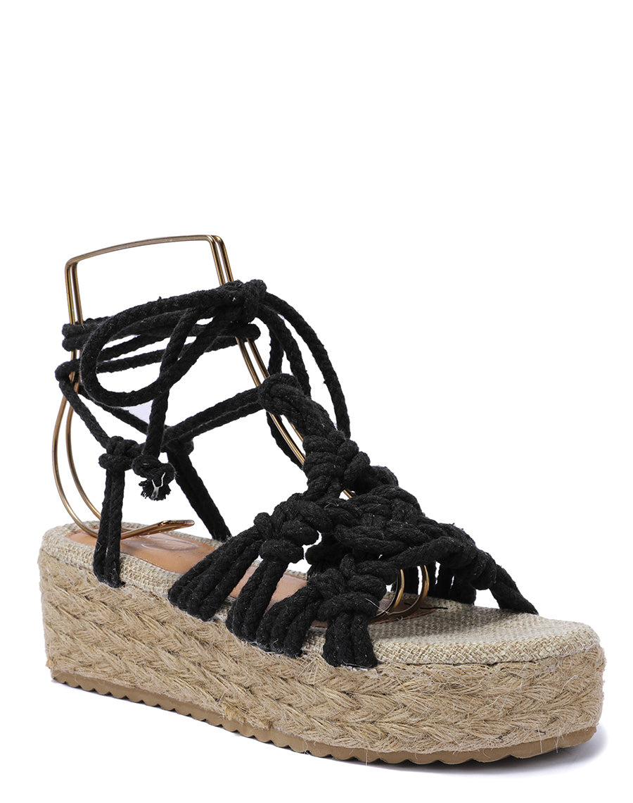 Sandales compensées noires nouées avec de larges cordes