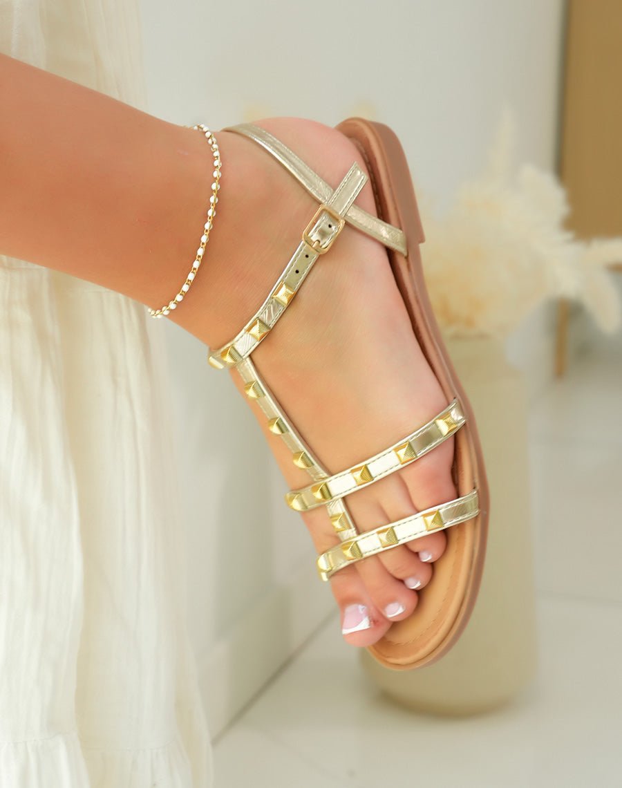 Sandales femme dorées luxueuses avec détails bijoux pour un éclat maximal